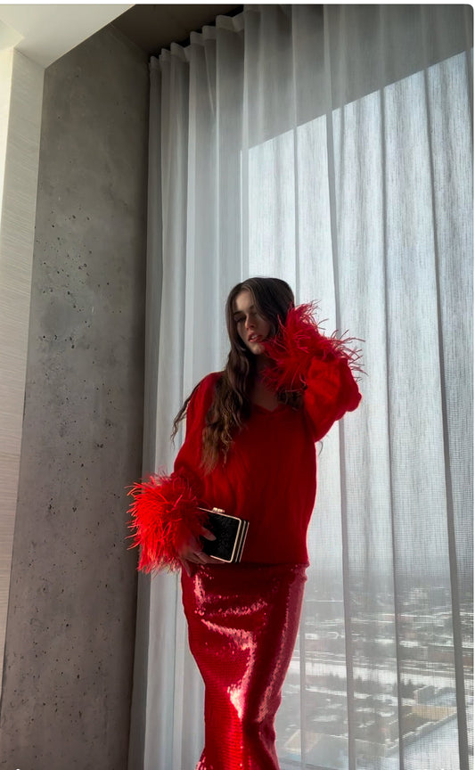 Runway Catalog model wears David Koma red sequins skirt and a cashmere Gucci jumper with feather sleeves