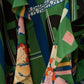 Vestido de seda con volantes y estampado de cuadros florales en verde