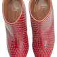  AlaïaStudded Leather Ankle Boots - Runway Catalog